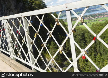 Love locks padlock. This is on Marys Bridge, overlooking Neuschwanstein Castle, Bavarian Alps, Germany, Europe.