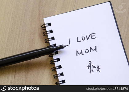 Love mom message on the white notepad