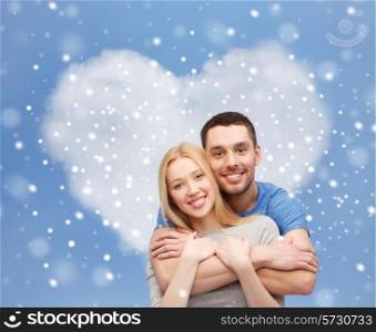 love, people and family concept - smiling couple hugging over blue sky, snow and heart shape cloud background