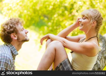 Love people and happiness concept. Travel loving couple having fun outdoor in forest.