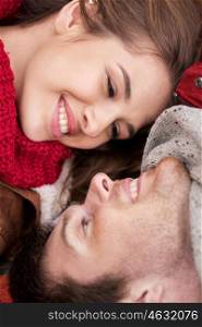 love, relationship, family and people concept - close up of happy smiling young couple faces