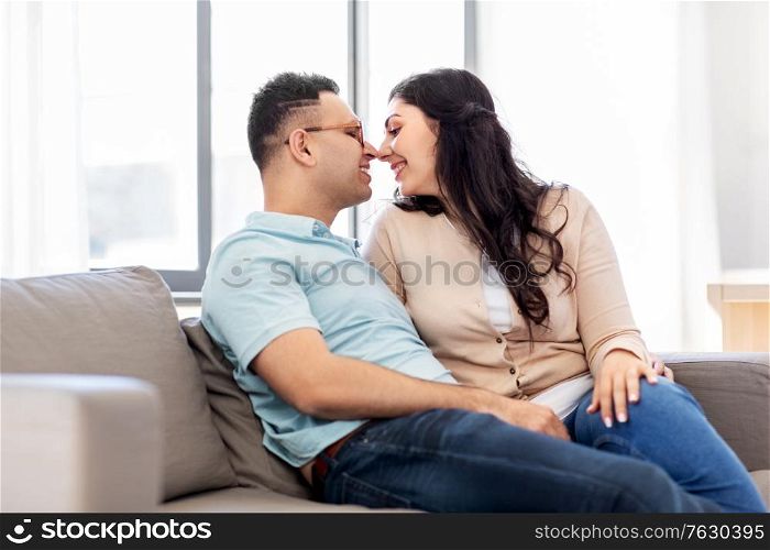 love, relationships and people concept - happy couple at home. happy couple at home