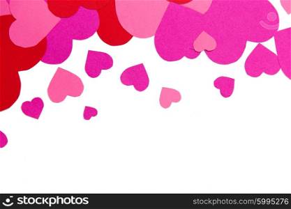 love, romance, valentines day and holidays concept - close up of red and pink heart shapes with copyspace