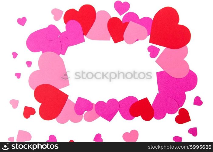 love, romance, valentines day and holidays concept - close up of red and pink heart shapes in frame