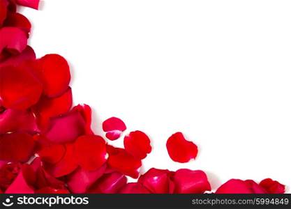 love, romance, valentines day and holidays concept - close up of red rose petals with copyspace