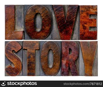 love story word abstract in vintage letterpress wood type blocks with ink patina