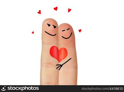 Love symbolized with two fingers painted isolated on white background