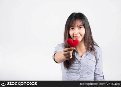 Love Valentine&rsquo;s Day. Woman beauty hands holding red heart for giving help donation medical healthcare concept isolated on white background, love holiday background concept