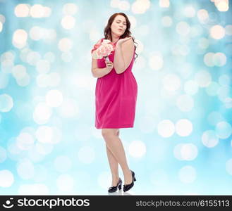 love, valentines day, holidays and people concept - smiling happy young plus size woman with flower bunch posing in pink dress over blue holidays lights background