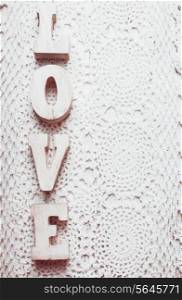 Love wooden letters on the crochet doily, vintage styled