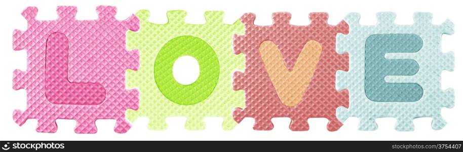 Love word created from Alphabet puzzle isloated on white background , with clipping path.