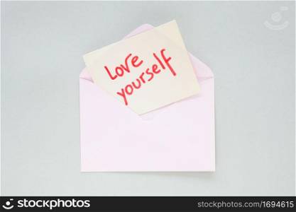 love yourself inscription paper light envelope