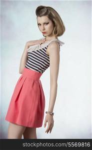 lovely blonde female posing in fashion shoot with vintage style, cute make-up and bracelets