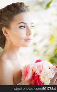 lovely bride with bouquet of flowers indoors. bride with bouquet of flowers