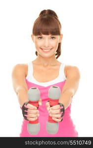 lovely fitness instructor with dumbbells over white