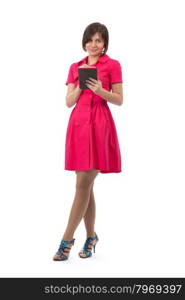 Lovely girl in a red dress with a tablet computer. Studio, full-length, isolate on white.