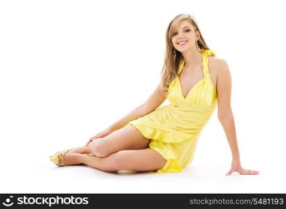 lovely girl in yellow dress over white