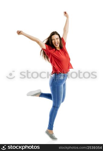 Lovely happy woman jumping of joy