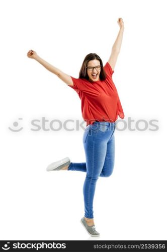 Lovely happy woman jumping of joy