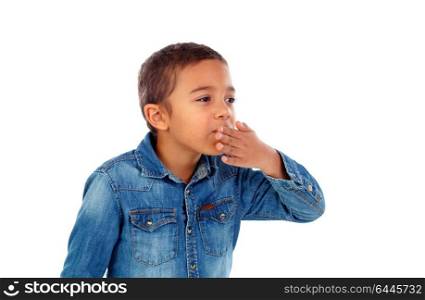 Lovely kid throwing a kiss isolated on a white background