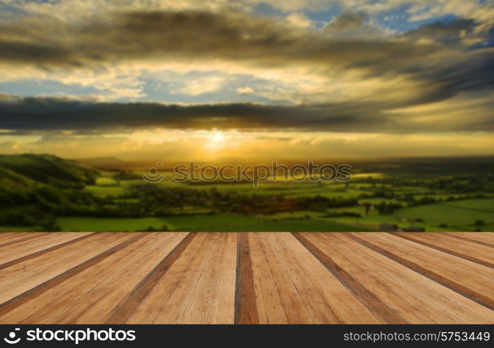 Lovely landscape of countryside hills and valleys with wooden planks floor