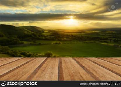 Lovely landscape of countryside hills and valleys with wooden planks floor