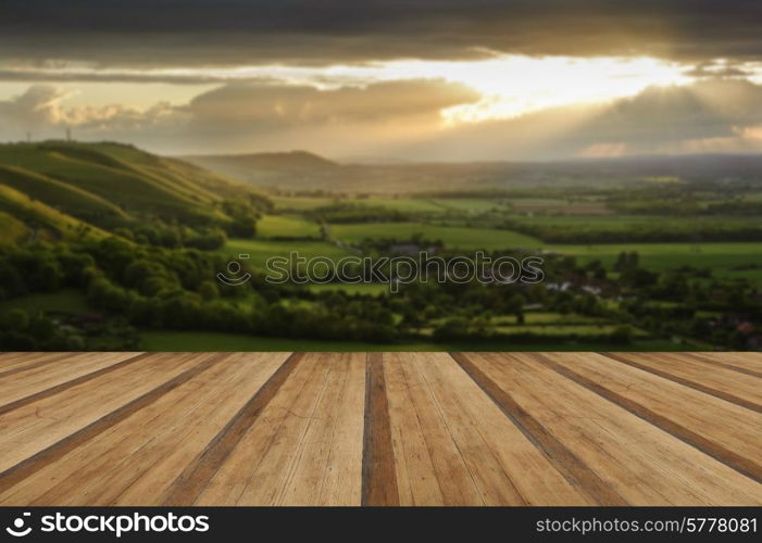 Lovely landscape of countryside hills and valleys with wooden planks floor