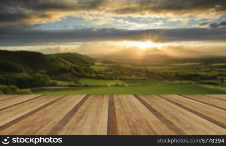 Lovely landscape of countryside hills and valleys with wooden planks floor