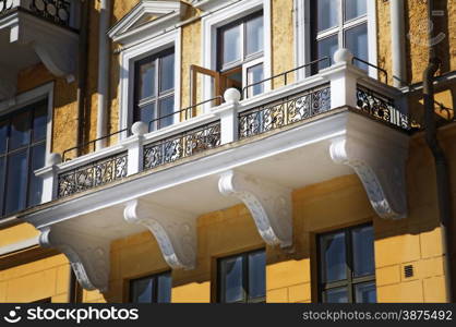 Lovely old house balcony with yellow wall