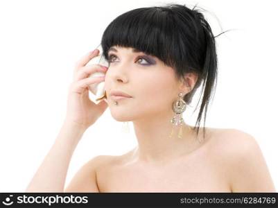 lovely oriental girl with shell over white