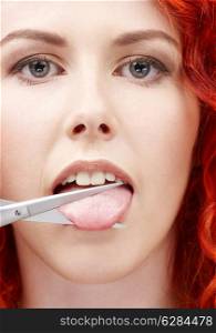 lovely redhead cutting tongue with scissors