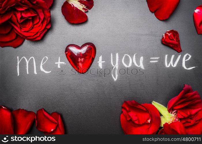 Lovely Valentines day card with red roses , heart and text: me plus you on black chalkboard, top view