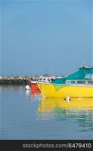 Lovely vibrant landscape image of leisure boats in harbor . Lovely colorful landscape image of leisure boats in harbor