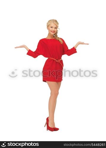 lovely woman in dress showing something on the palms of her hands