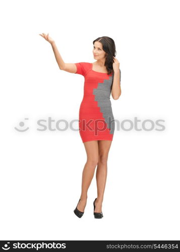 lovely woman in elegant dress showing direction