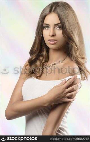 lovely woman in sexy pose with white undershirt and stylish necklace, showing her naked shoulder with charming eyes