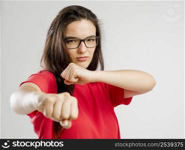 Lovely woman pretending that she&rsquo;s fighting