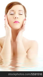 lovely woman washing face in water