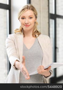 lovely woman with an open hand ready for handshake