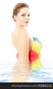 lovely woman with colorful cloth in water