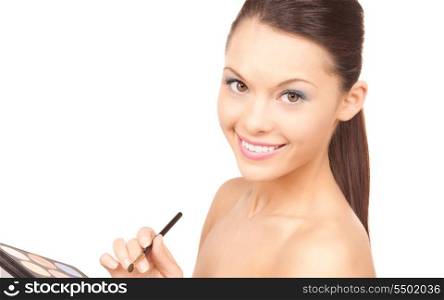 lovely woman with palette and brush over white&#xA;