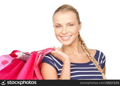 lovely woman with shopping bags over white