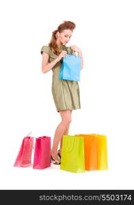 lovely woman with shopping bags over white