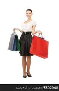 lovely woman with shopping bags over white&#x9; &#xA;