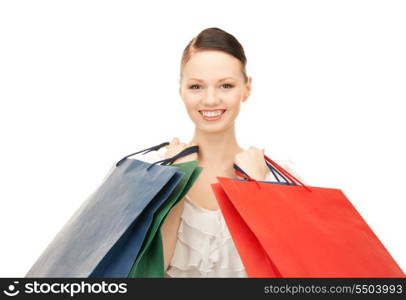 lovely woman with shopping bags over white&#x9; &#xA;