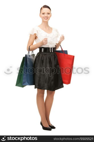 lovely woman with shopping bags over white&#x9; &#xA;