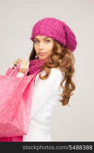 lovely woman with shopping bags over white&#xA;