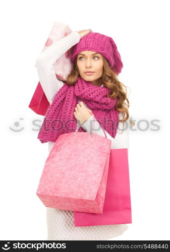 lovely woman with shopping bags over white&#xA;