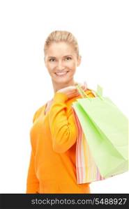 lovely woman with shopping bags over white&#xA;