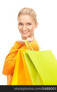 lovely woman with shopping bags over white&#xA;